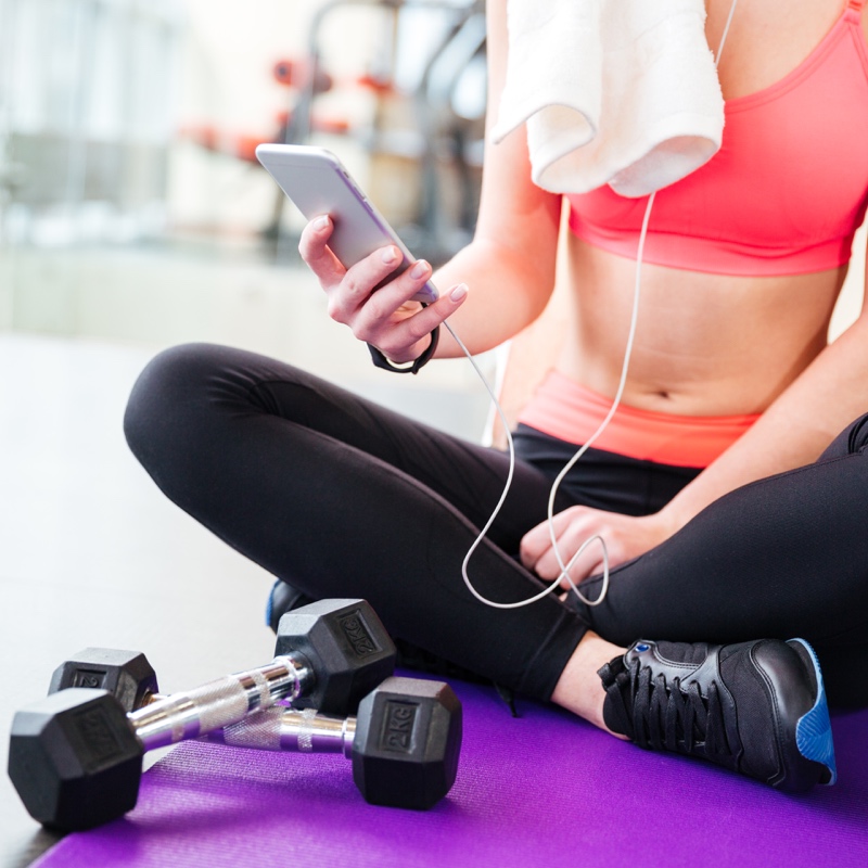 A women using fitness application for yoga & excercise